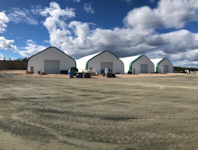 storage fabric structures on shop yard